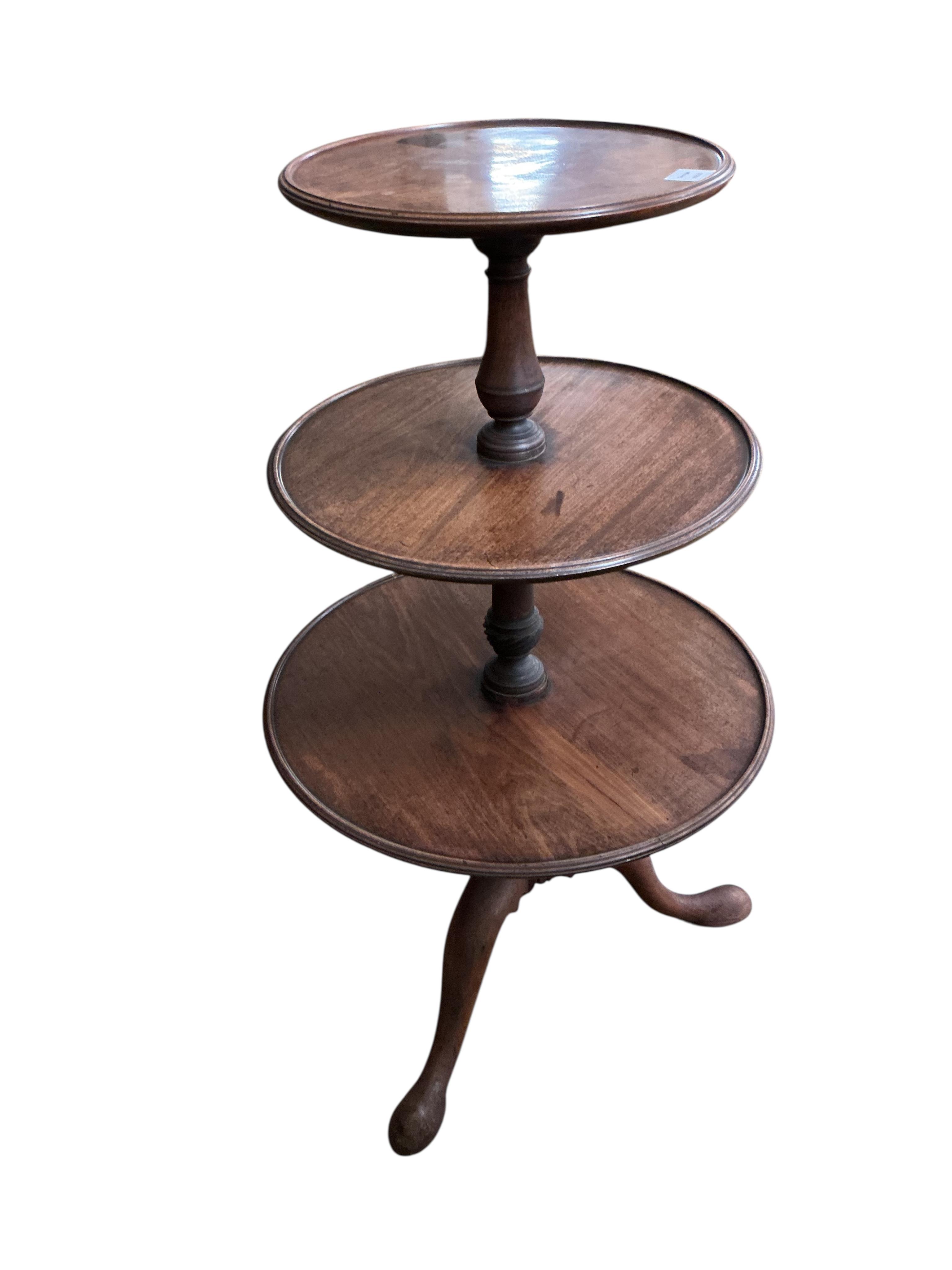 A George III mahogany three tier whatnot, height 106cm